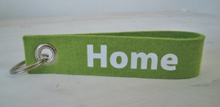 Filzschlüsselband Grün mit Home Aufdruck in Weiss